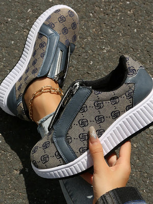 Logo print zip-up platform sneakers in tan with gray accents and a white sole.