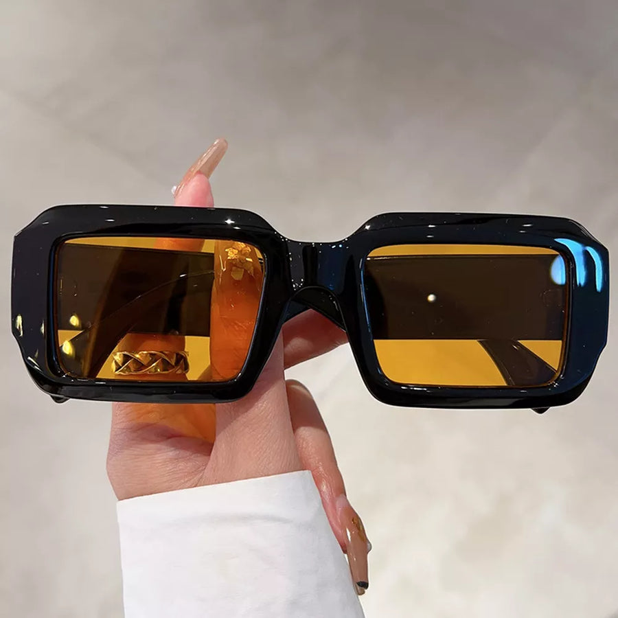 PC Frame material: Polycarbonate Lens material: Polycarbonate Temple material: P sunglasses in orange with rectangular