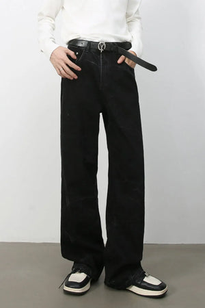 Faded black wide-leg denim jeans with a relaxed fit.