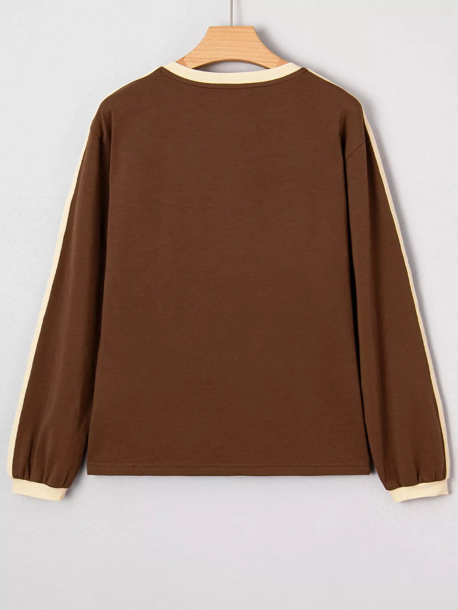 Contrast crew-neck long-sleeve t-shirt in dark brown with cream trim on sleeves and neckline.