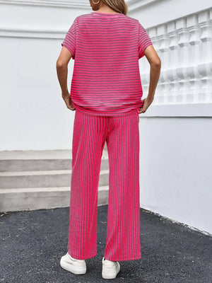 black two-piece set with pullover, drawstring, elastic and striped