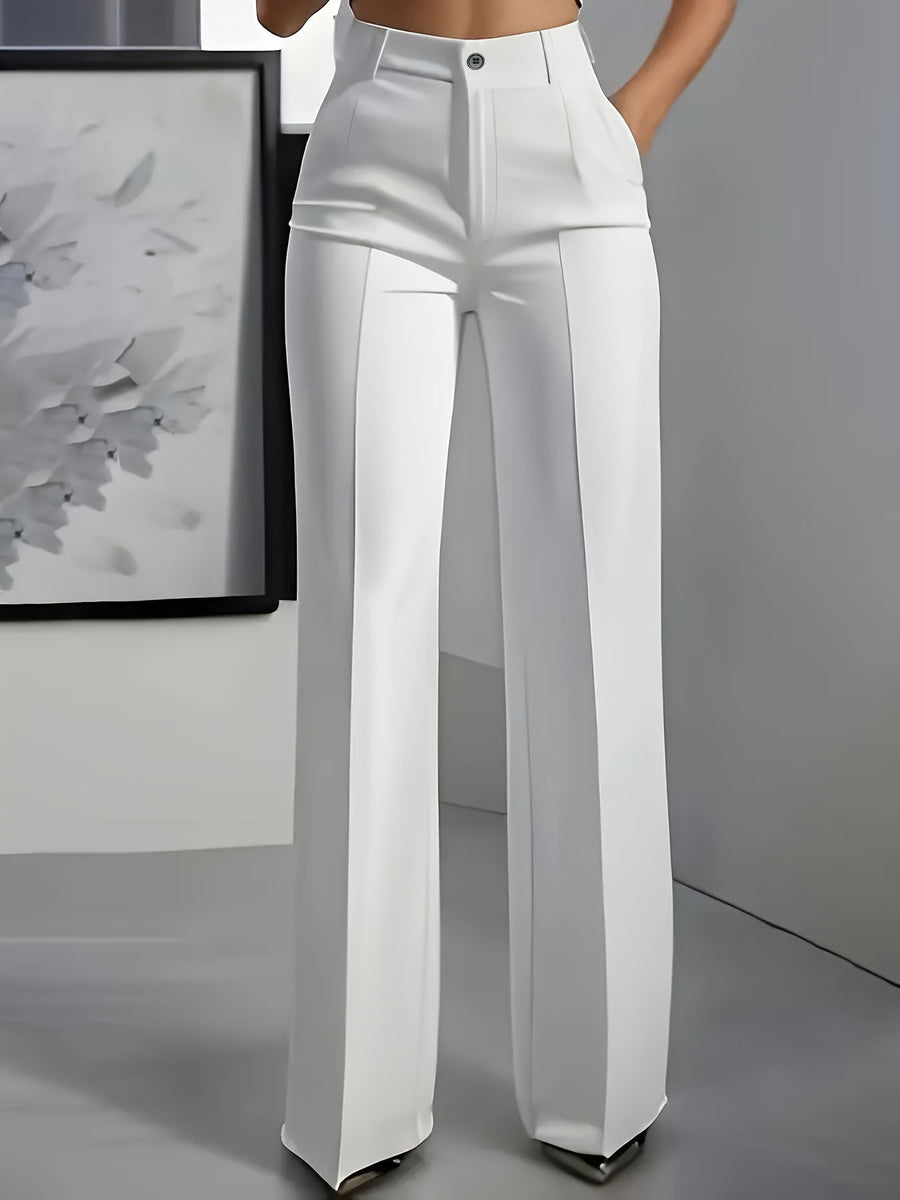 wide-leg pants in white featuring high-waisted and flared fit