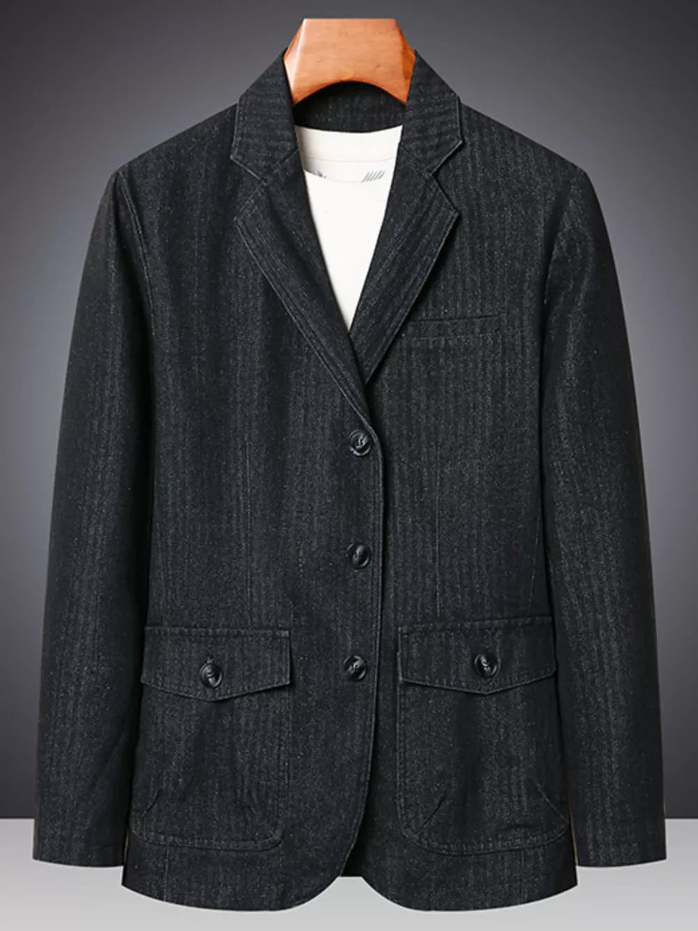 Textured black denim blazer with notched lapels and button-down front.