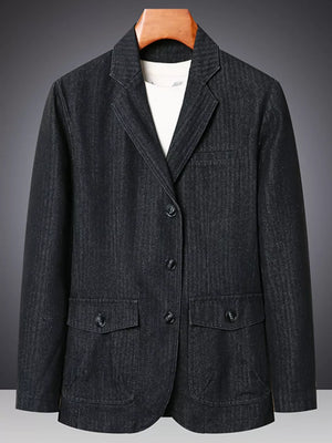 Textured black denim blazer with notched lapels and button-down front.
