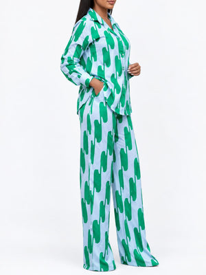 two-piece set in kelly green with buttoned and full-length