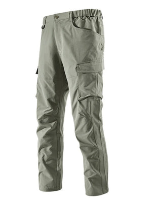 Sage cargo pants with elastic waist, drawstring, and multiple pockets.