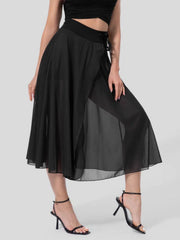 Black flowy midi skirt with shorts liner and drawstring detail.
