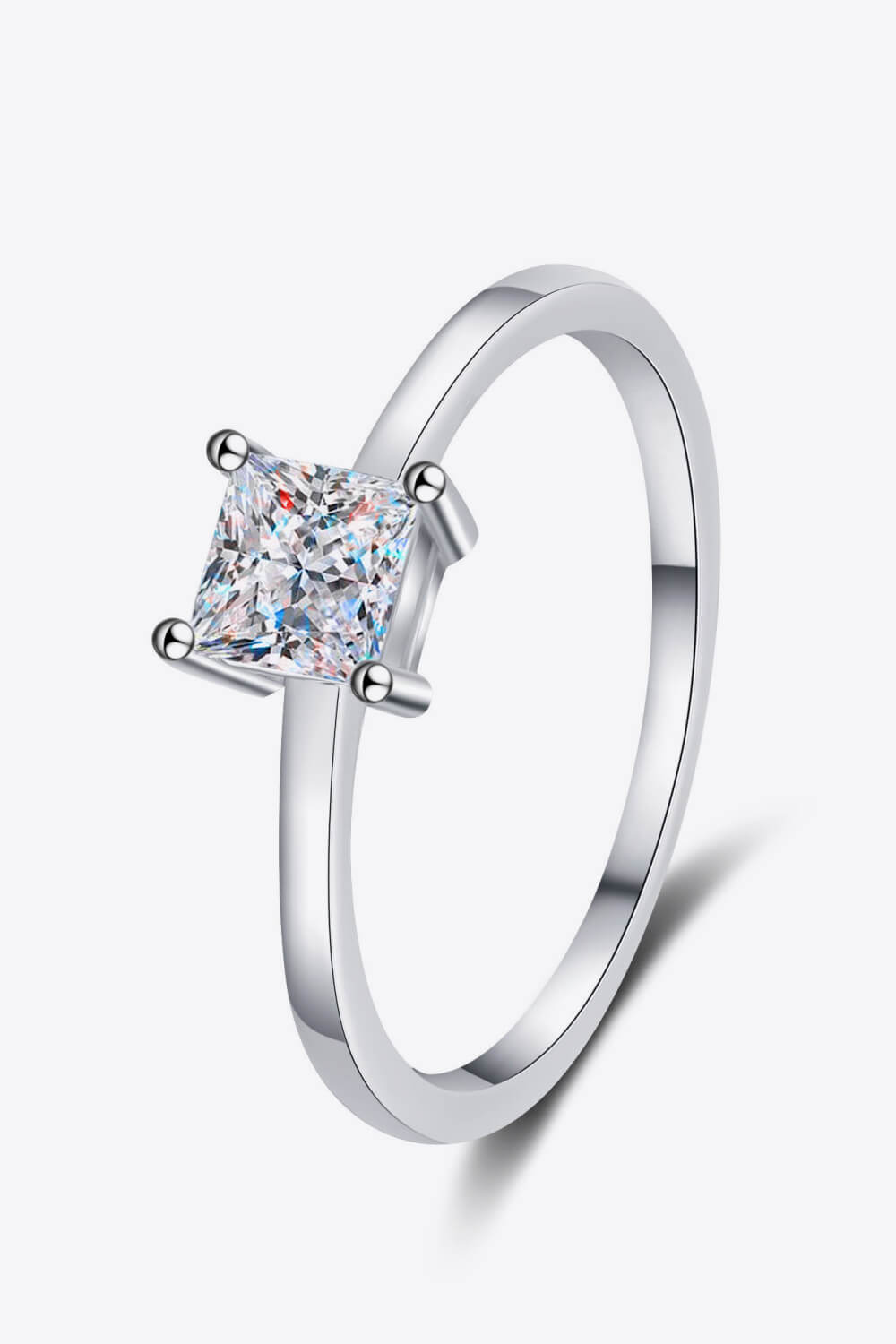 Silver ring with a square cut moissanite stone