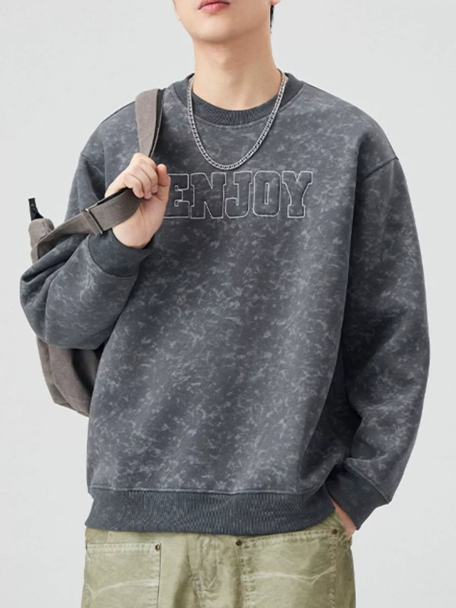 Men's dark gray acid wash sweatshirt with embroidered "ENJOY" text and crewneck.