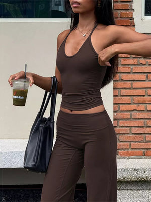 Brown halter crop top and wide-leg pants set with a smooth finish.