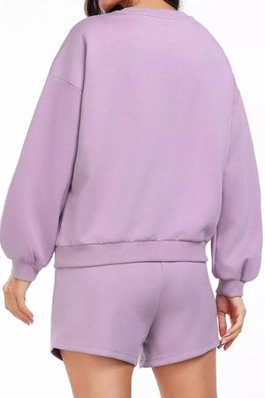 Cozy two-piece sweatshirt set in Pink Purple with balloon sleeves and drawstring shorts.