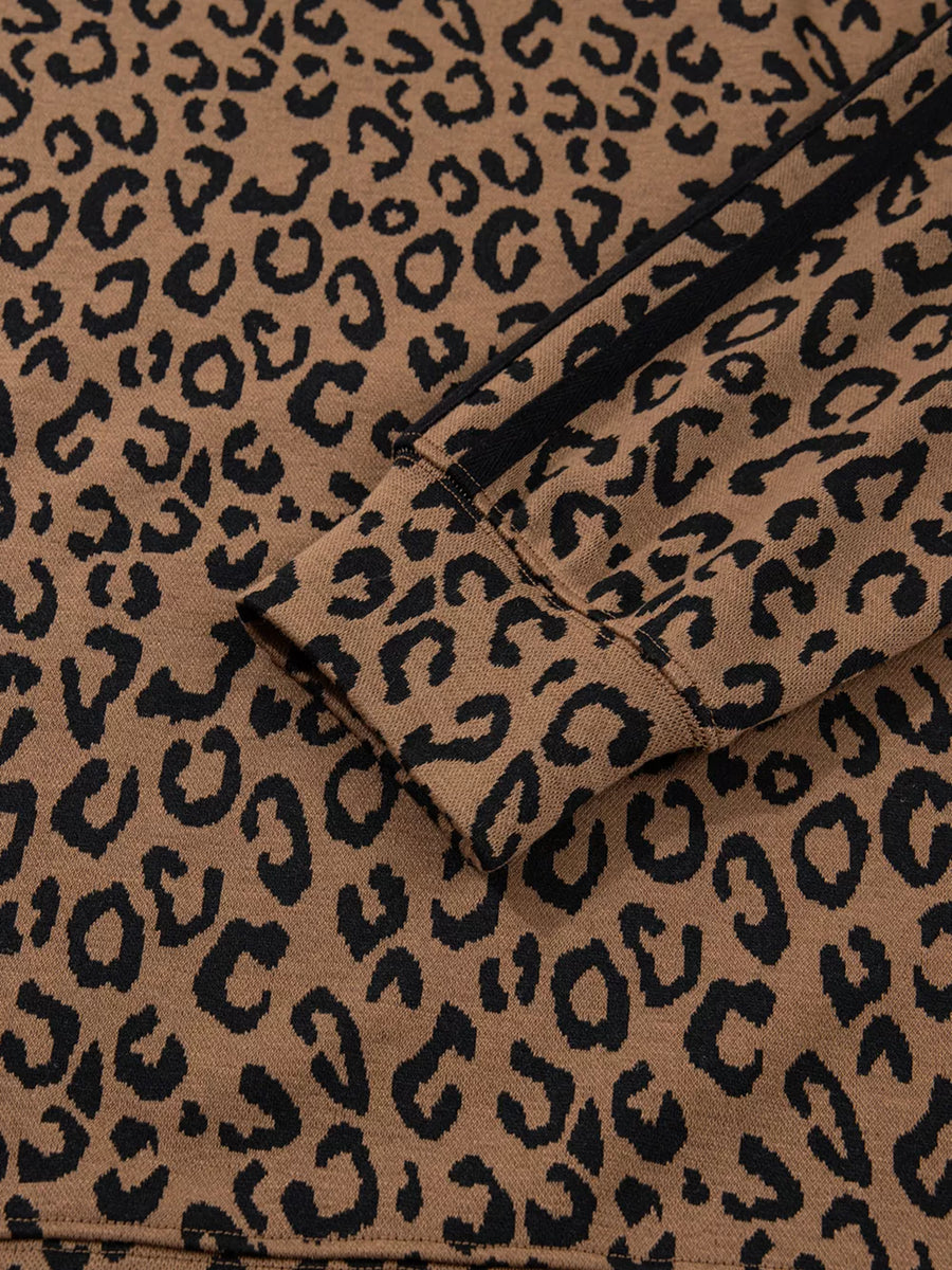 Brown leopard print joggers with black side stripes and drawstring detail.