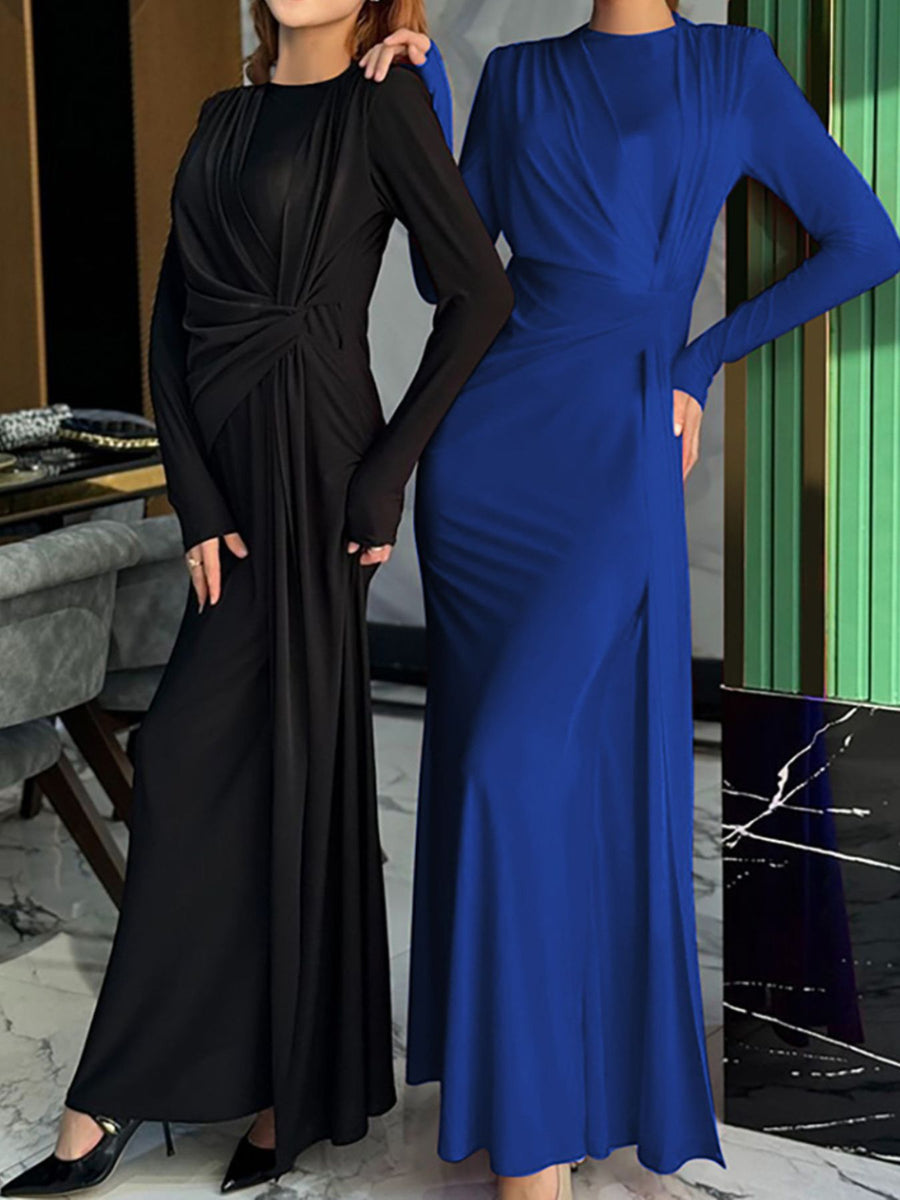 Black and blue ruched knot front maxi dresses with long sleeves and side slits.