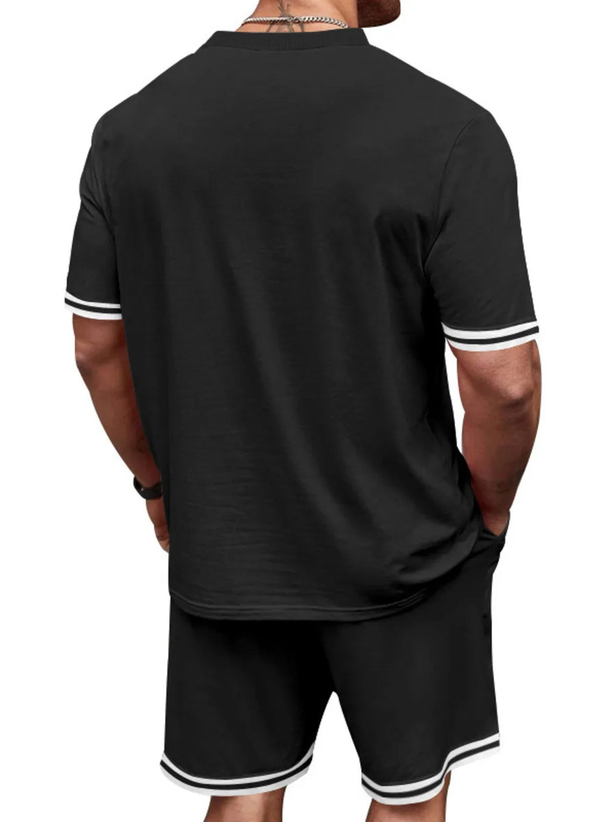 Black t-shirt and shorts set with white stripe trim on sleeves and hem