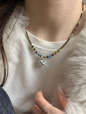 necklace in brown featuring beaded and straight fit
