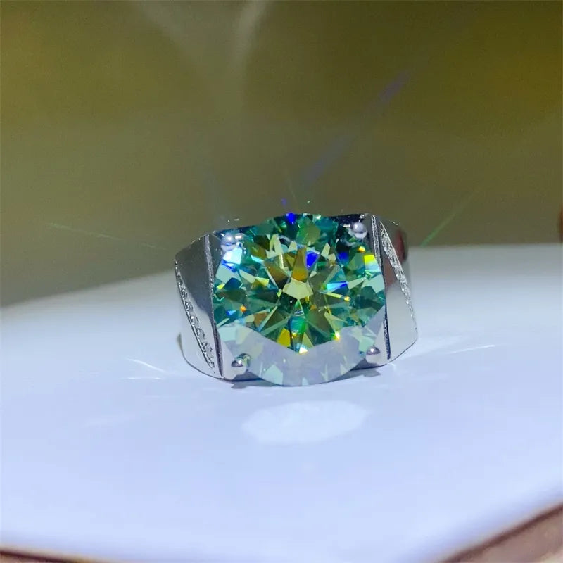 Silver signet ring with large emerald cut moissanite stone