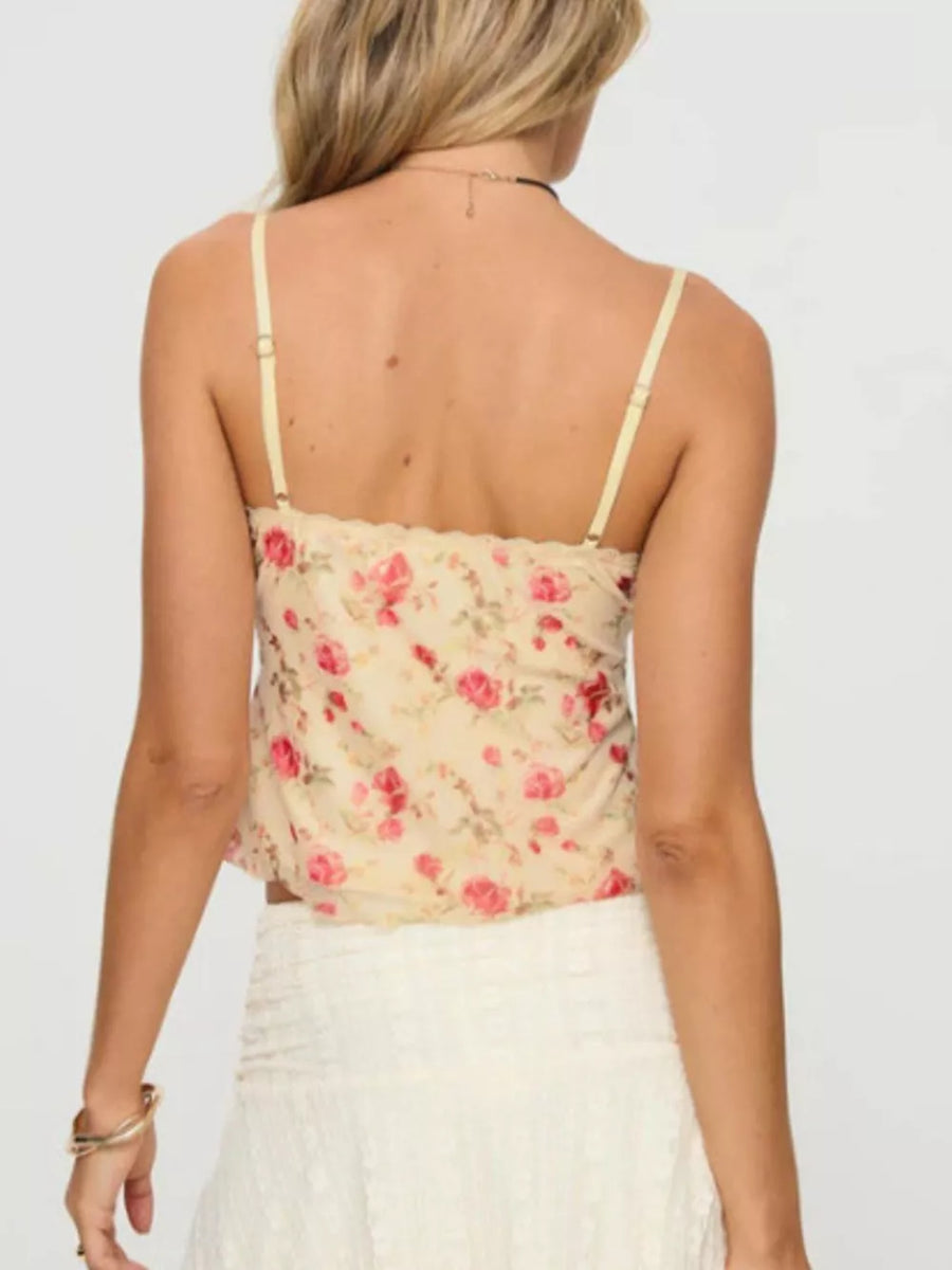 Floral lace trim cami top with adjustable straps and rose print.