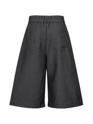 79% polyester, 21% viscose Care instructions: Machine wash cold capris in Black with wide-leg silhouette