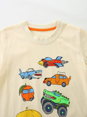 Cream cotton toddler t-shirt with cartoon vehicles including a shark car, rocket car, dog car, and monster truck.