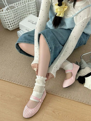 socks in white featuring ruffled trim and fitted fit