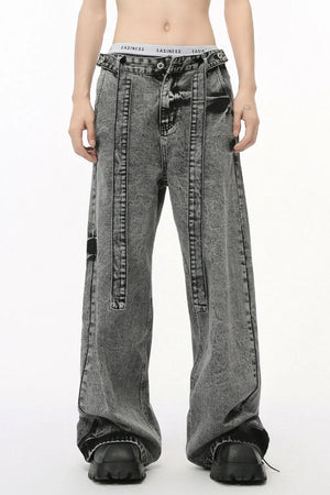 Acid wash belted palazzo jeans in dark wash with a relaxed fit and wide leg.
