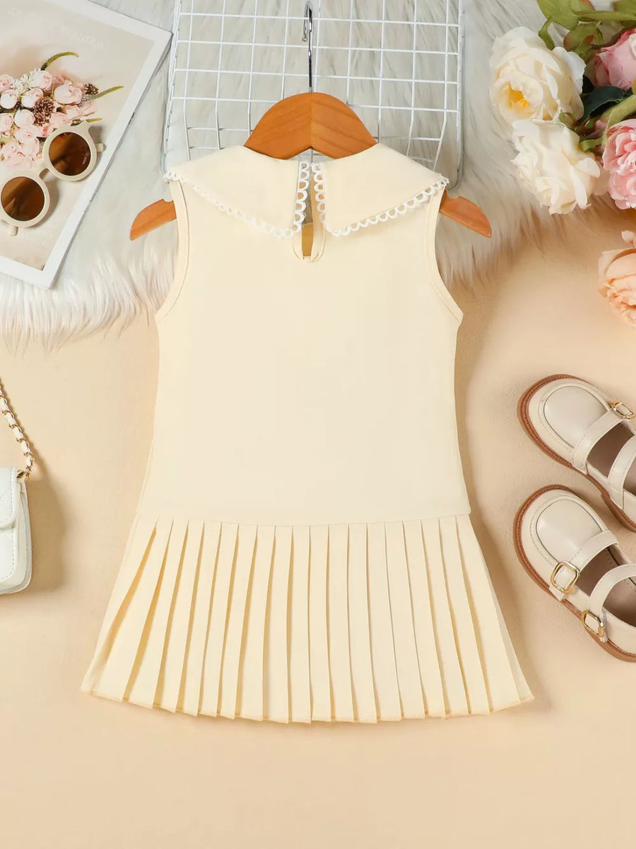 Apricot toddler dress with lace collar and pleated skirt