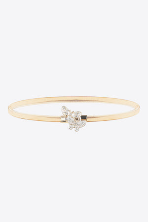 Gold elastic belt with a crystal butterfly clasp detail