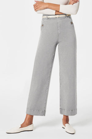 Light Gray wide-leg utility denim trousers with button details and a white belt.