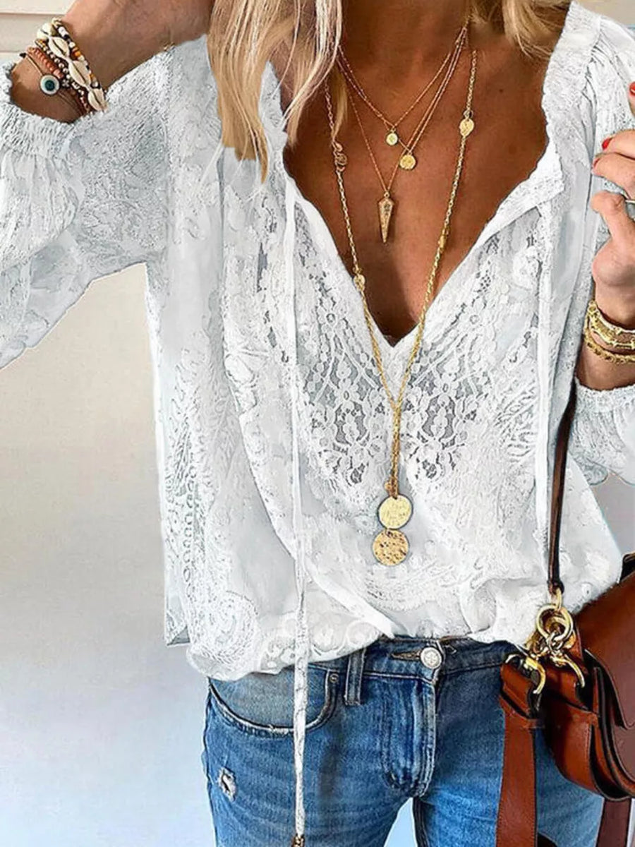 White relaxed blouse with v-neck
