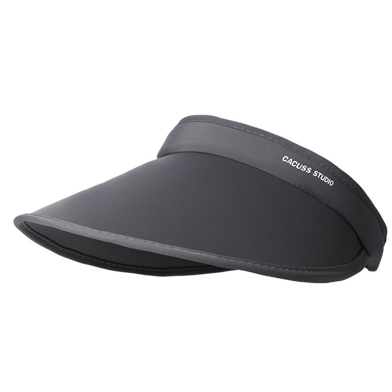 Grey nylon sun visor with curved brim and subtle logo detail.