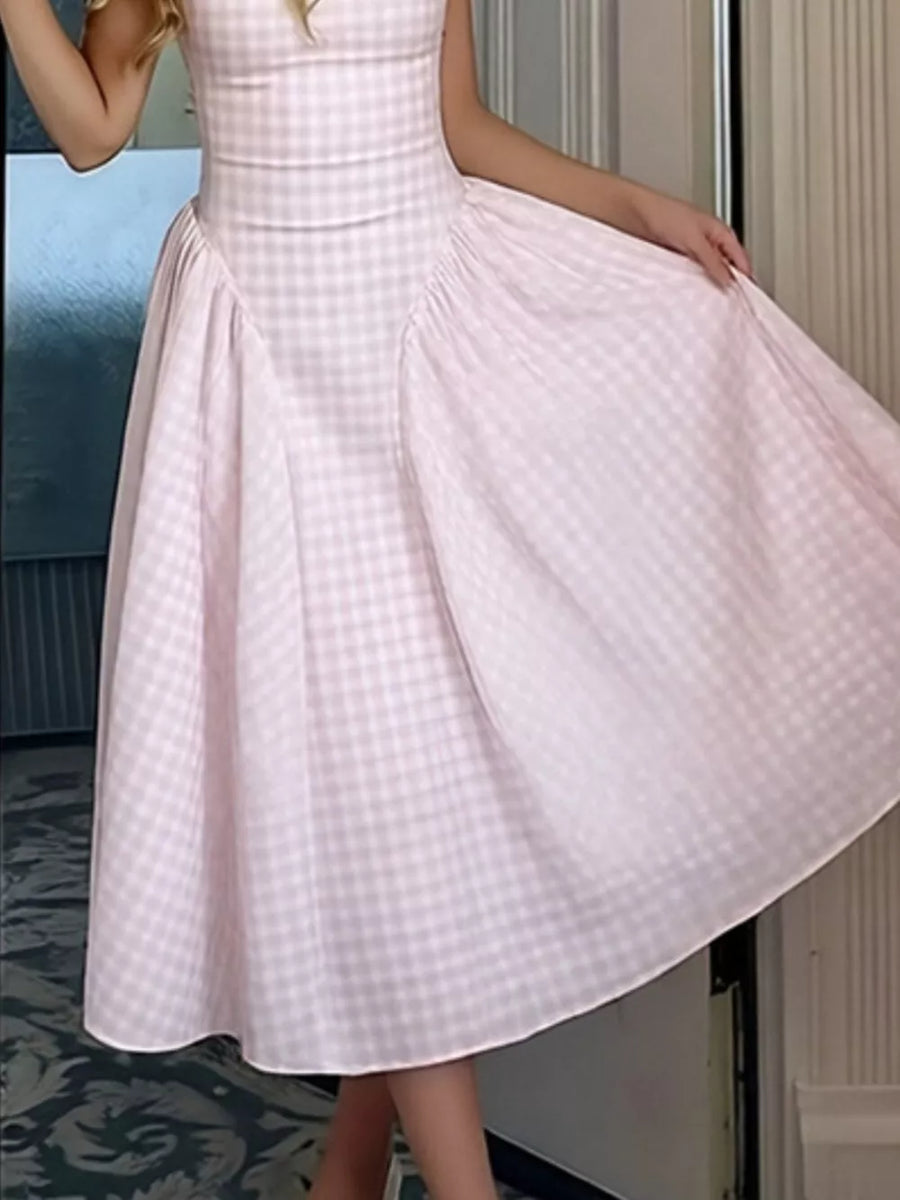 Plaid square neck midi dress in blush pink with a-line skirt and ruched detail.