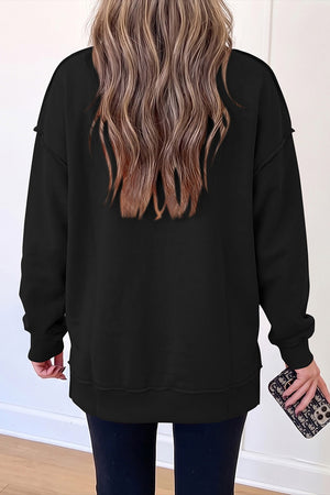 Black sweatshirt with tunic-length and pullover