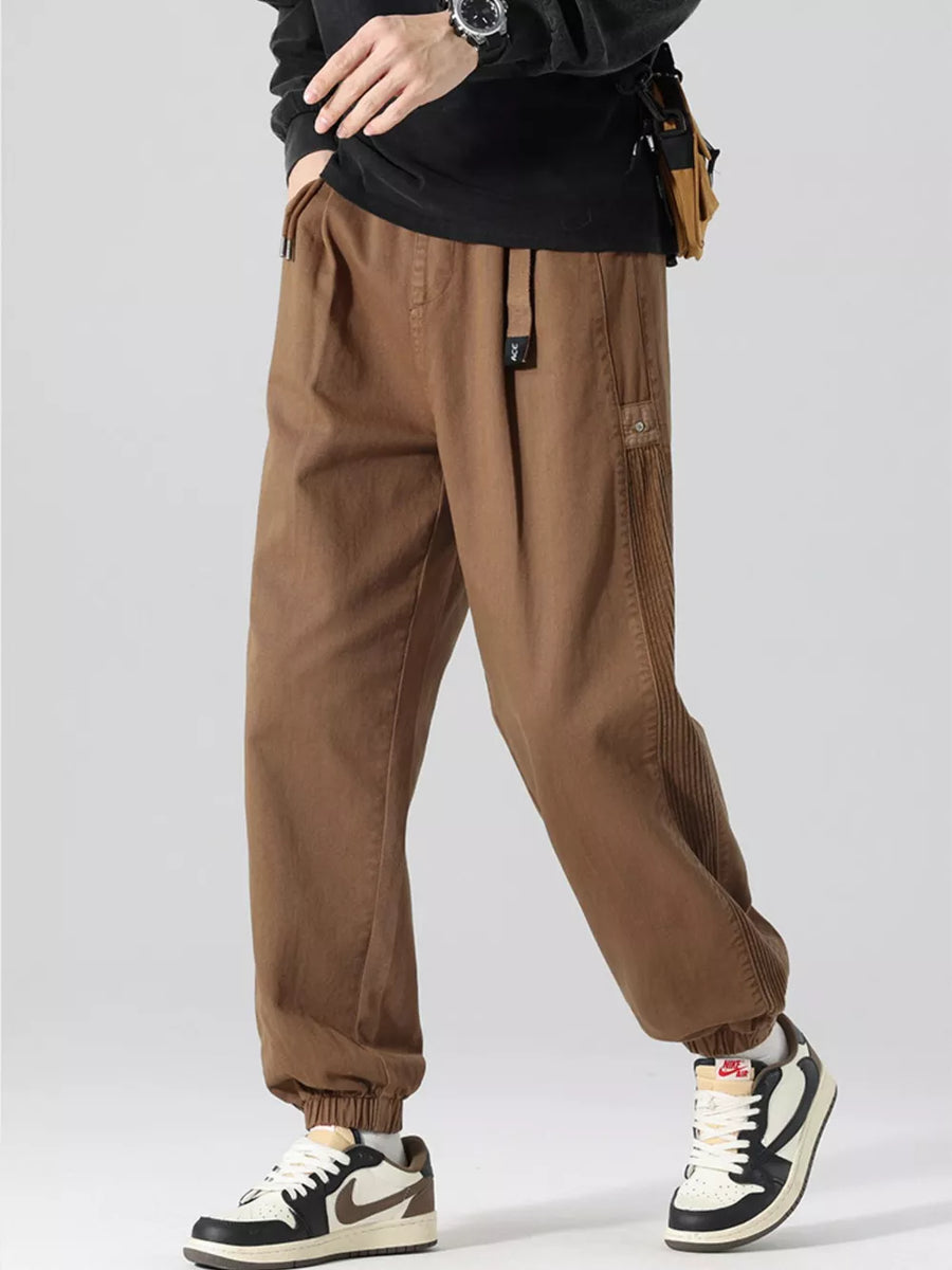 Oversized coffee cargo joggers with drawstring waist and elastic cuffs.
