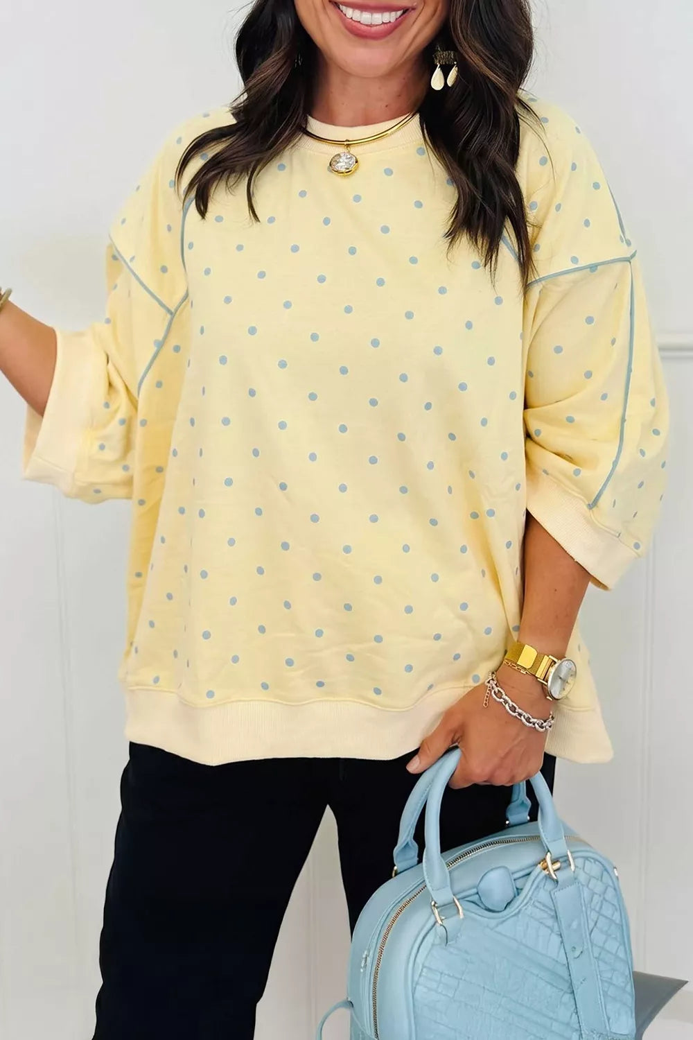 light yellow sweatshirt with polka dot and crew neck