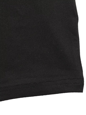 Black long-sleeve ruched dress with a slit detail.