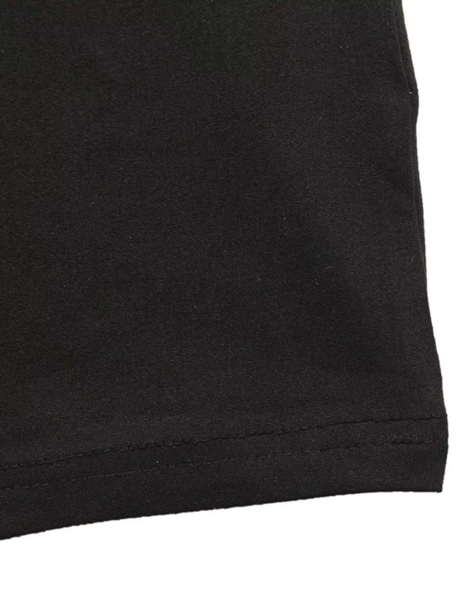 Black long-sleeve ruched dress with a slit detail.