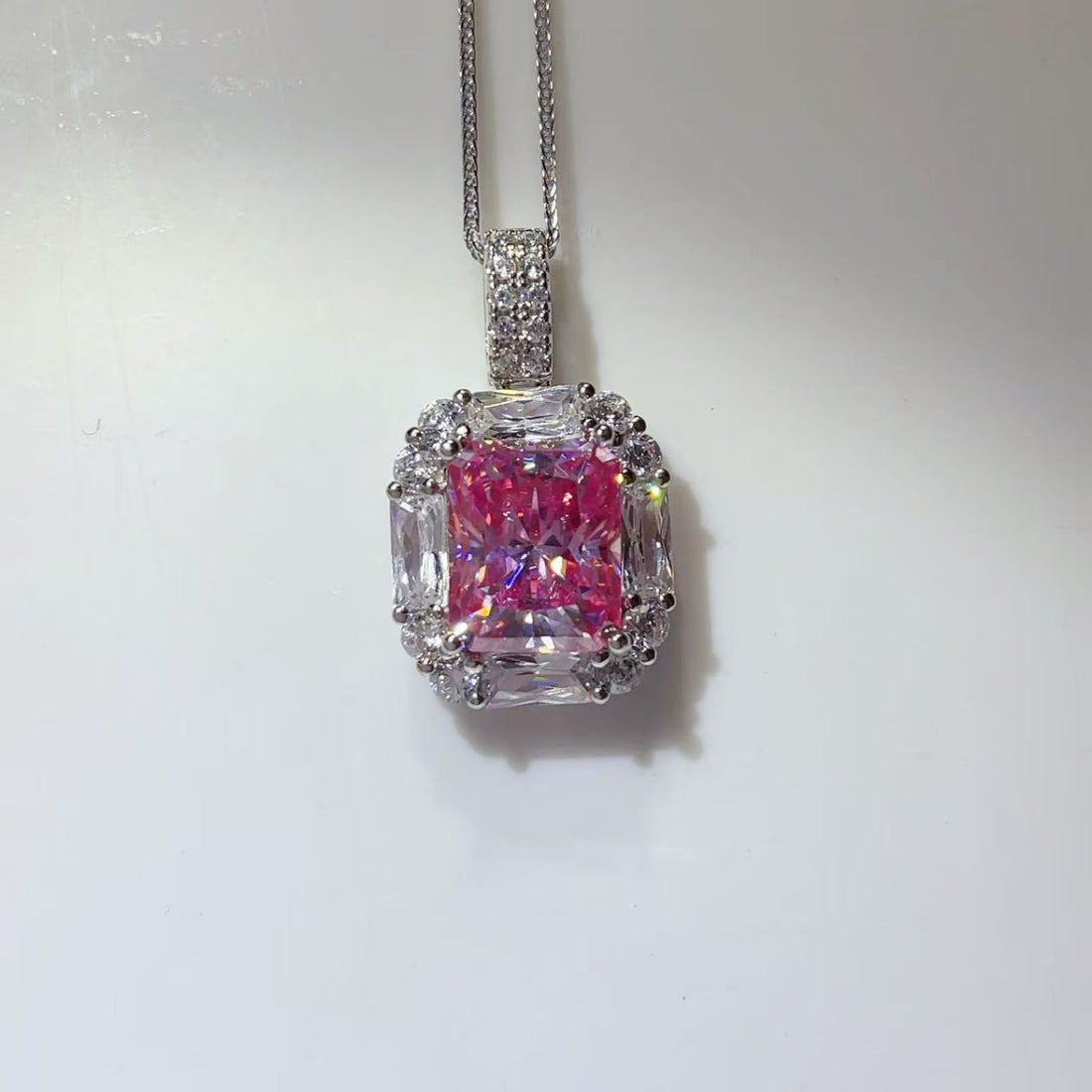 necklace in pink featuring moissanite and geometric fit