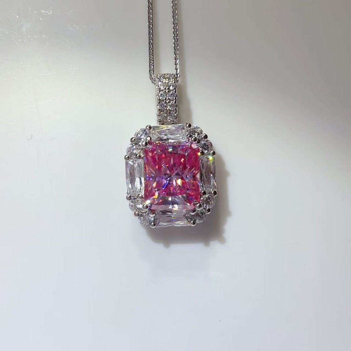necklace in pink featuring moissanite and geometric fit