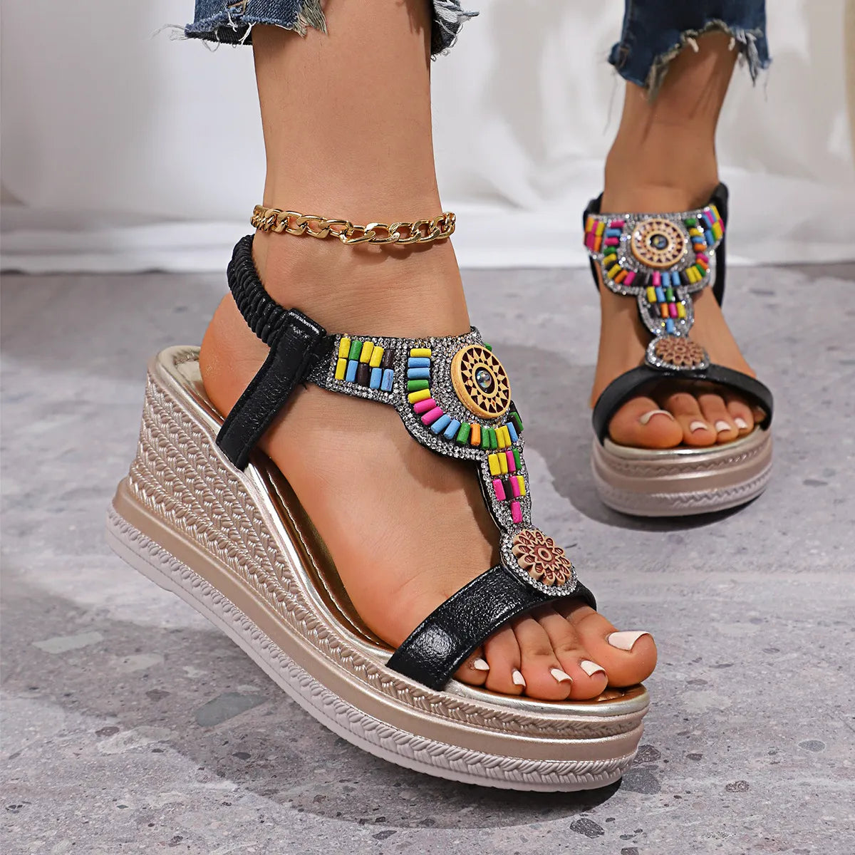 Black bohemian platform wedge sandals with colorful bead and rhinestone embellishments.