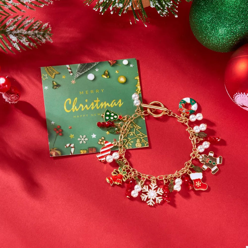 bracelet in gold featuring christmas charms and chain fit