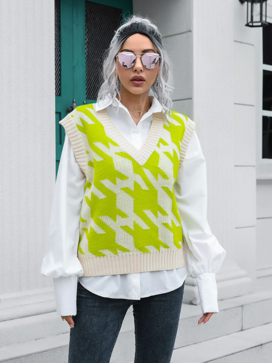 Houndstooth knit v-neck pullover vest in lime and cream acrylic with ribbed trim.