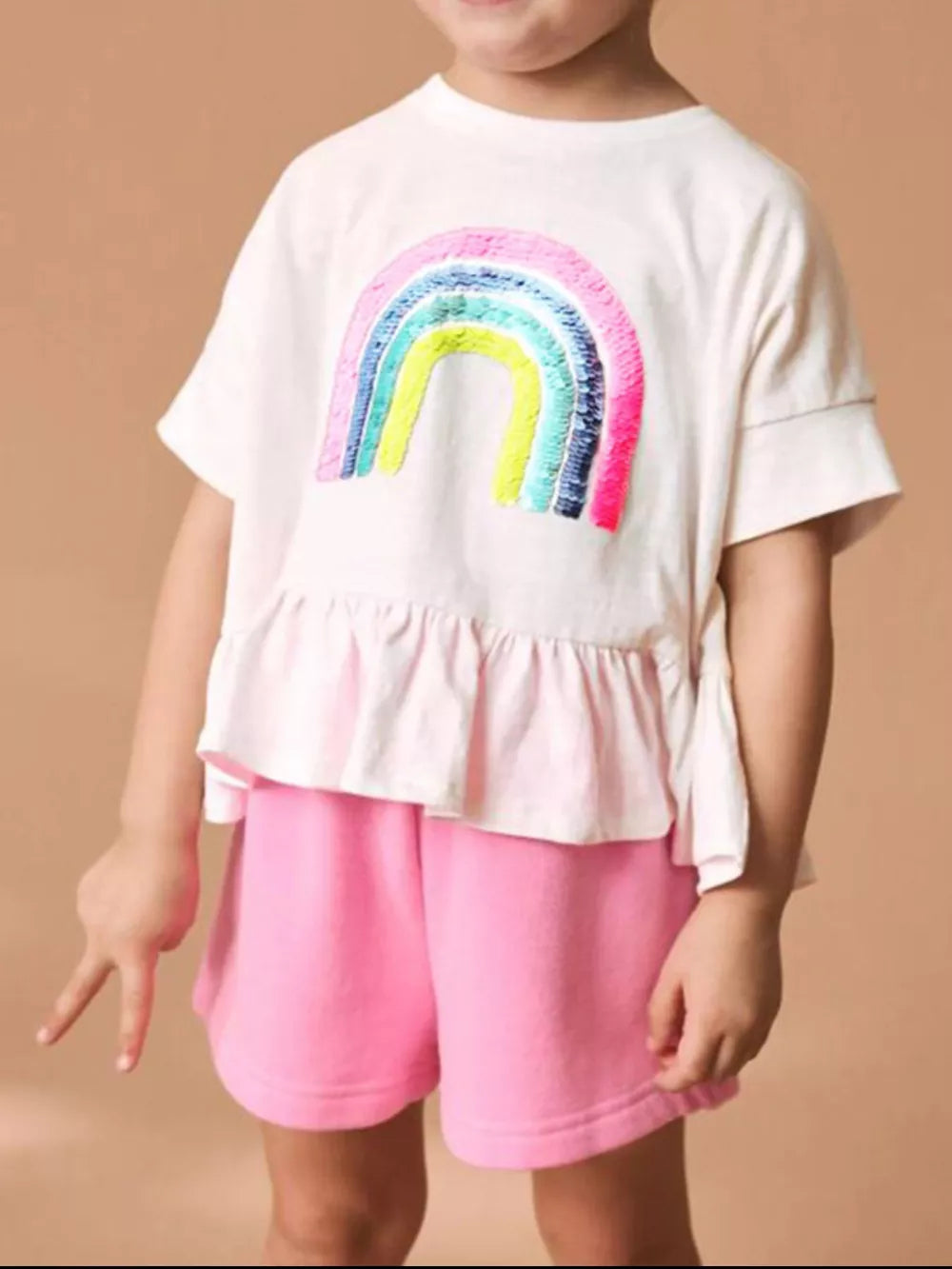 Girls' white cotton top with rainbow sequins and pink shorts set