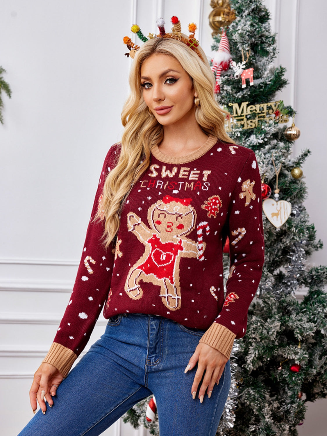 Burgundy acrylic knit sweater with gingerbread man graphic and SWEET CHRISTMAS text.
