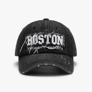 Distressed dark gray denim baseball cap with embroidered Boston text and frayed details.