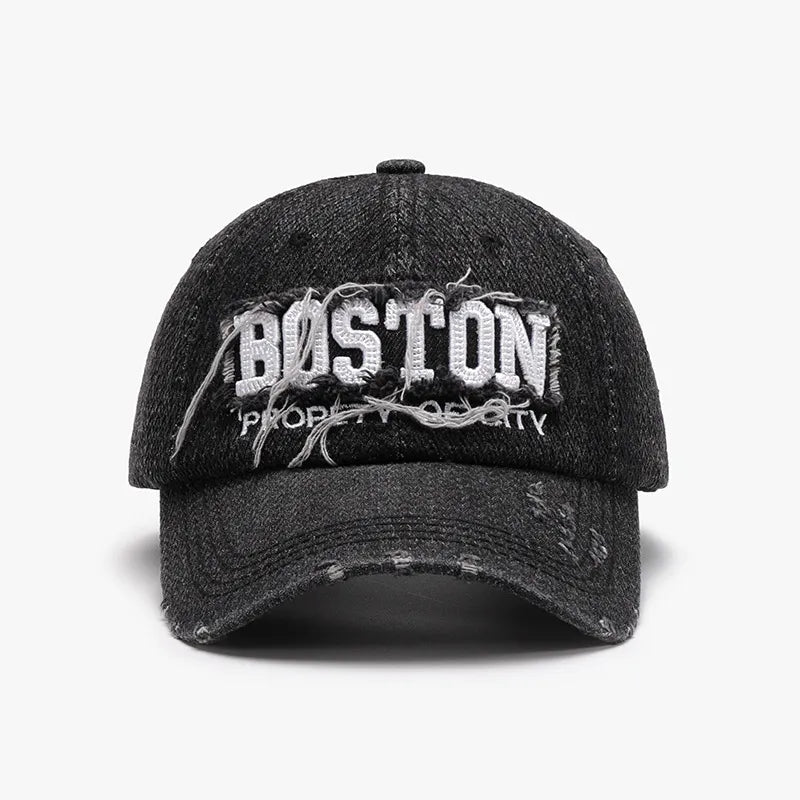 Distressed dark gray denim baseball cap with embroidered Boston text and frayed details.