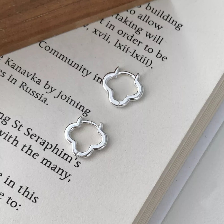 silver earrings with hoop design and not applicable