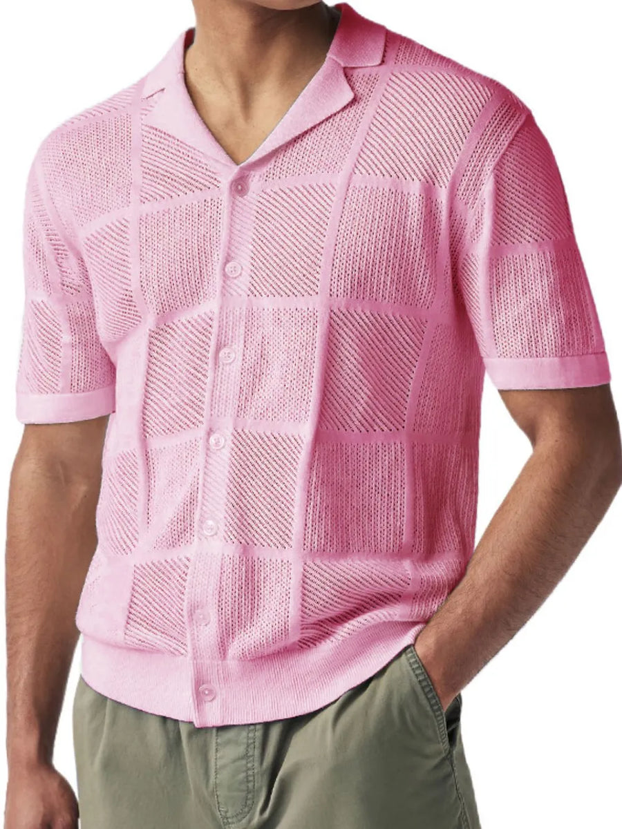 Pink geometric knit polo shirt with button front and spread collar.