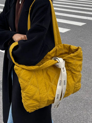 Mustard diamond quilt nylon tote bag with logo strap detail