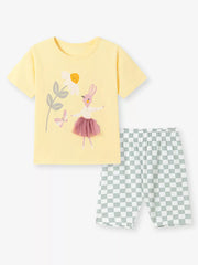 Yellow cotton t-shirt with bunny graphic and checkered shorts.