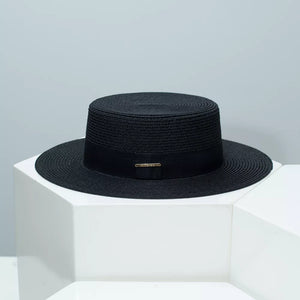 Black straw boater hat with elegant band and gold detail